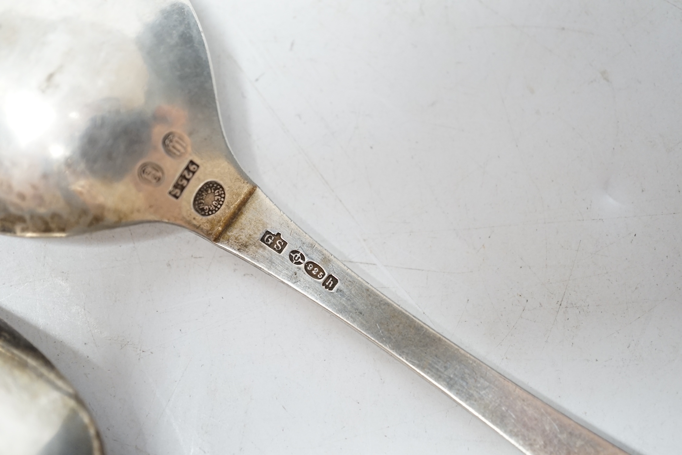 A George IV silver caddy spoon, Taylor & Perry, Birmingham, 1829, 11.4cm, together with a George V silver Georg Jensen spoon, import marks for London, 1923. Condition - fair